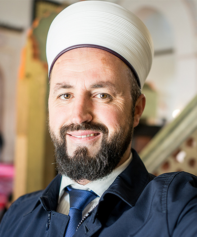 Photo of smiling Imam who support religious freedom